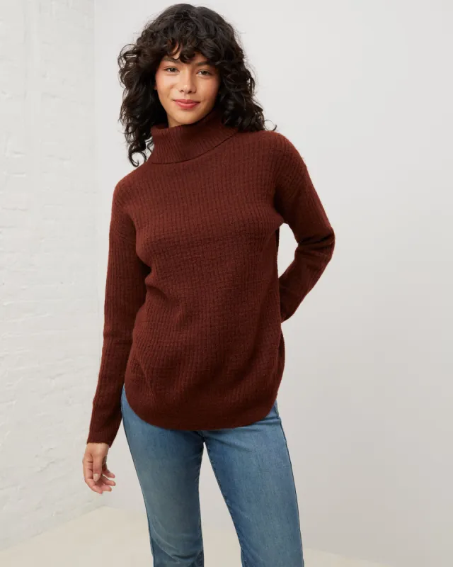 Comfy Curved Hem Turtleneck Sweater sold by UpWest
