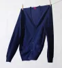 The V-Neck Button Down Cashmere Cardigan with Pockets sold by State Cashmere