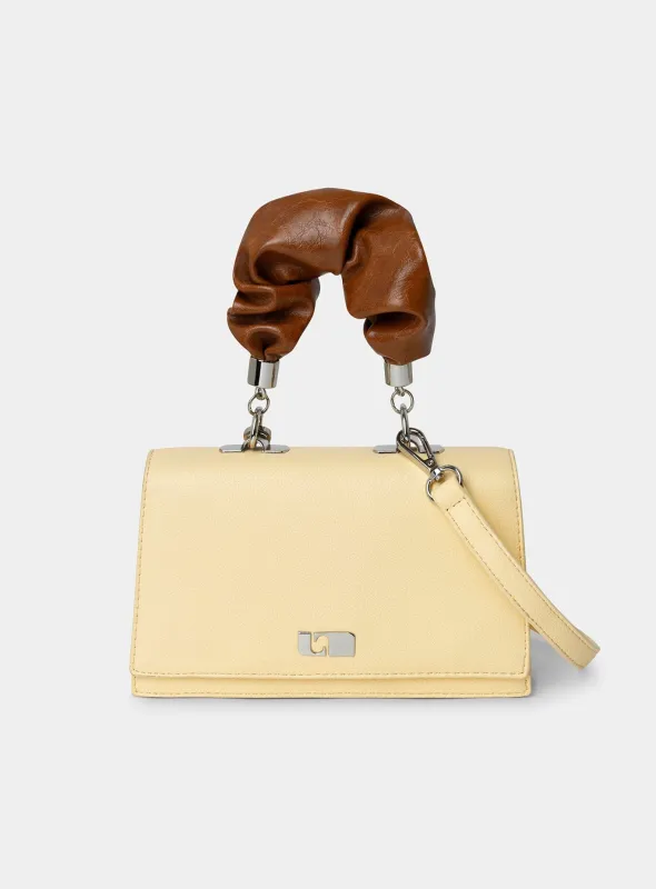 BLISS BUTTER CLUTCH BAG sold by LAAGAM