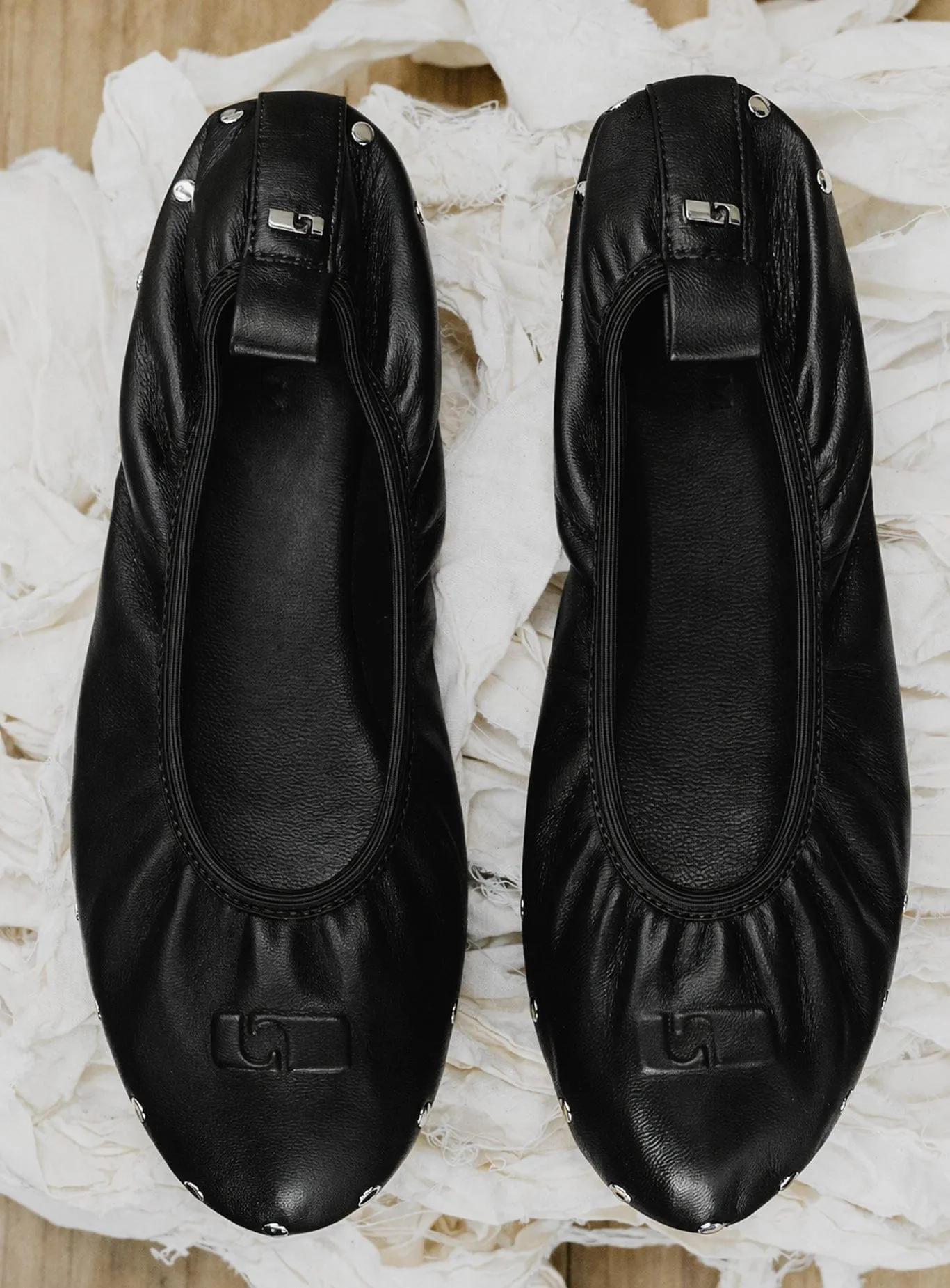 PLIÉ BLACK STUDS BALLERINA sold by LAAGAM