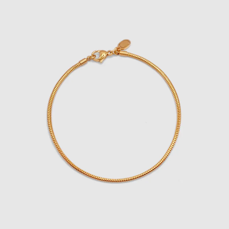 Snake Bracelet (Gold) 2mm sold by Craftd London