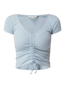 DETAILED FRONT TIE TOP sold by FBO