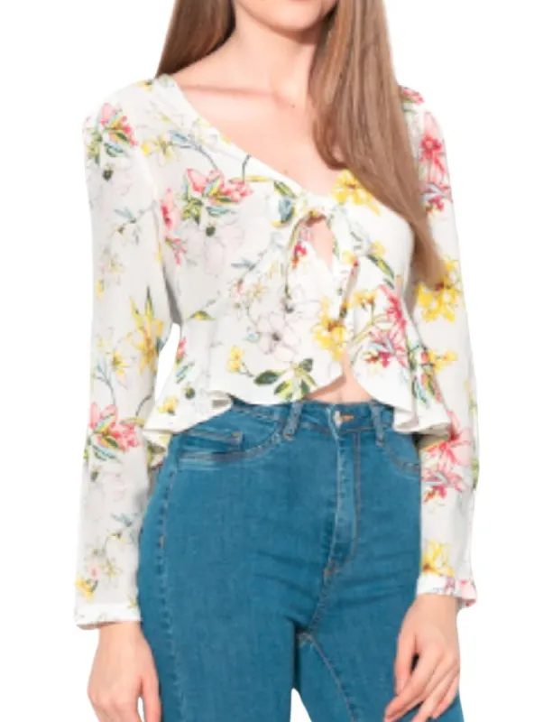 FLORAL TIE FRONT PEPLUM BLOUSE sold by FBO