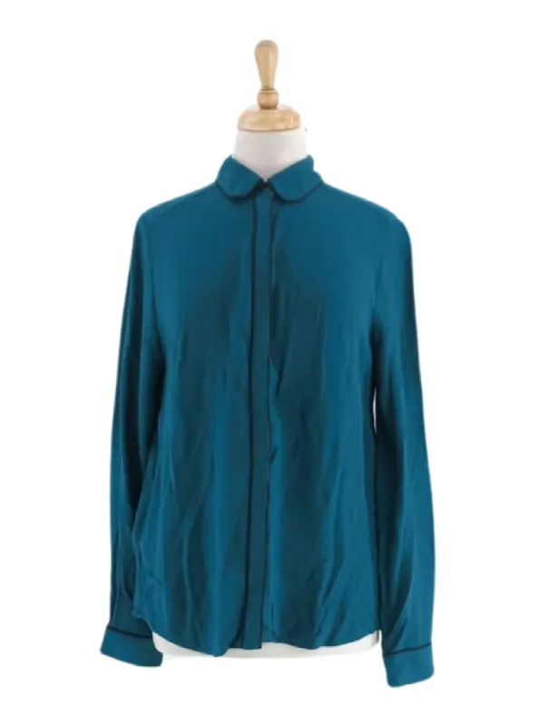 TEXTURED LONG SLEEVE BLOUSE sold by FBO