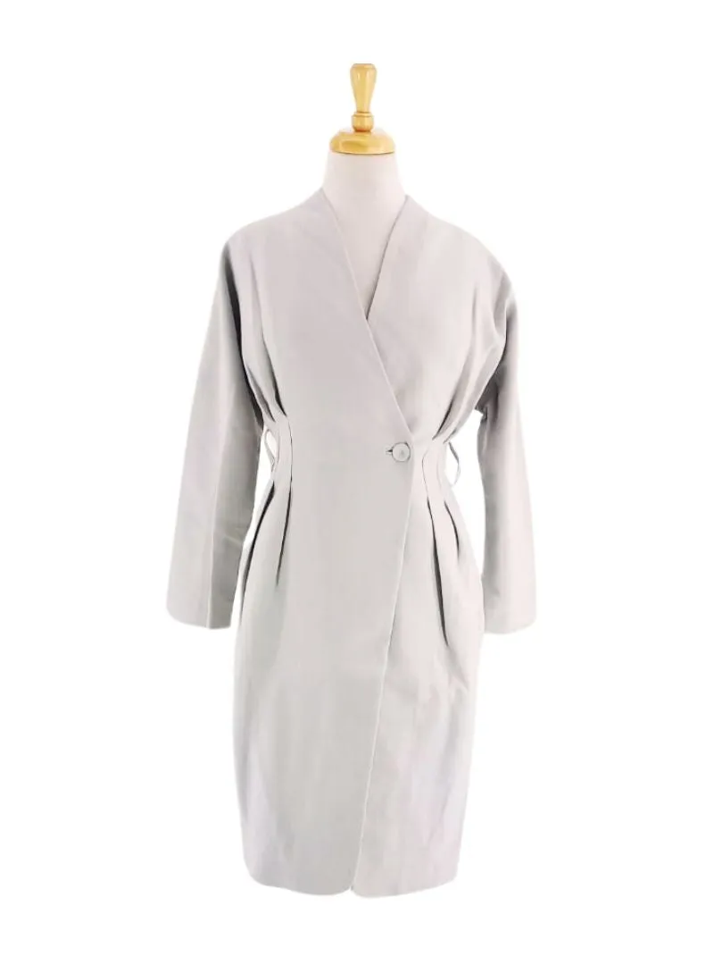 BUTTONED COAT WITH BELT sold by FBO