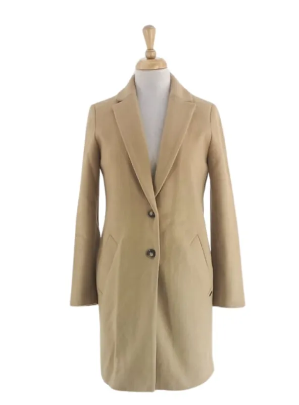 BUTTONED COAT sold by FBO