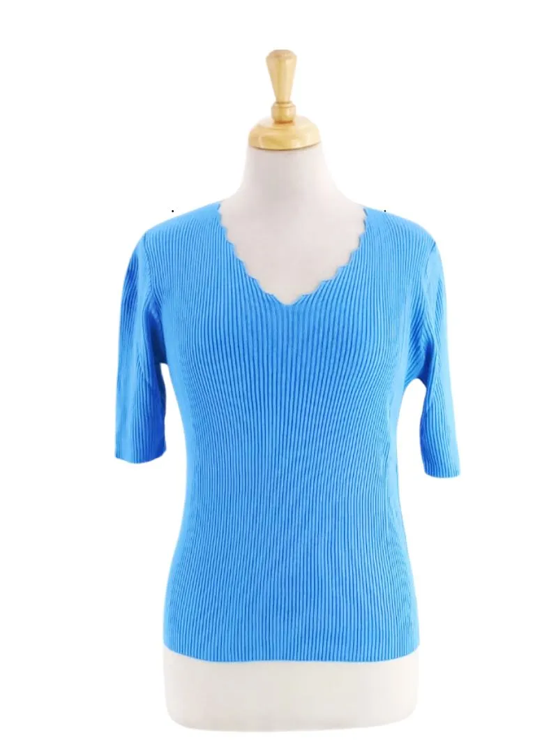 RIBBED KNIT TOP sold by FBO