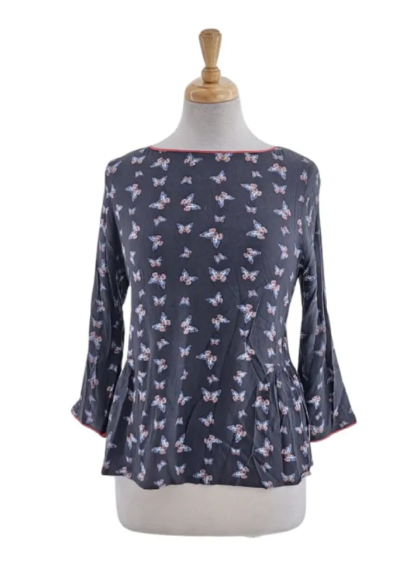 BUTTERFLY DETAILED LOW BACK BLOUSE sold by FBO