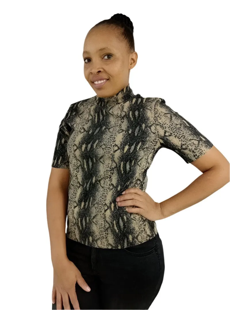SNAKE PRINT KNIT sold by FBO