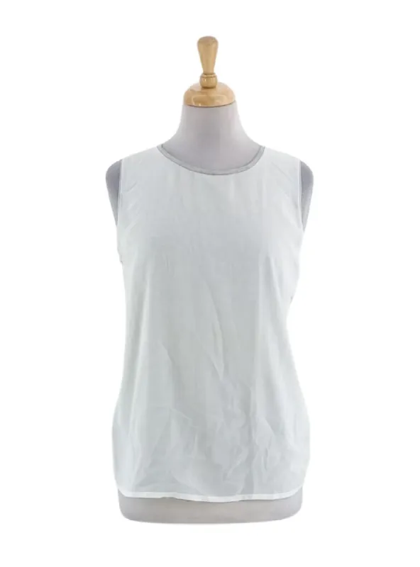 SLEEVELESS COMBO BLOUSE sold by FBO