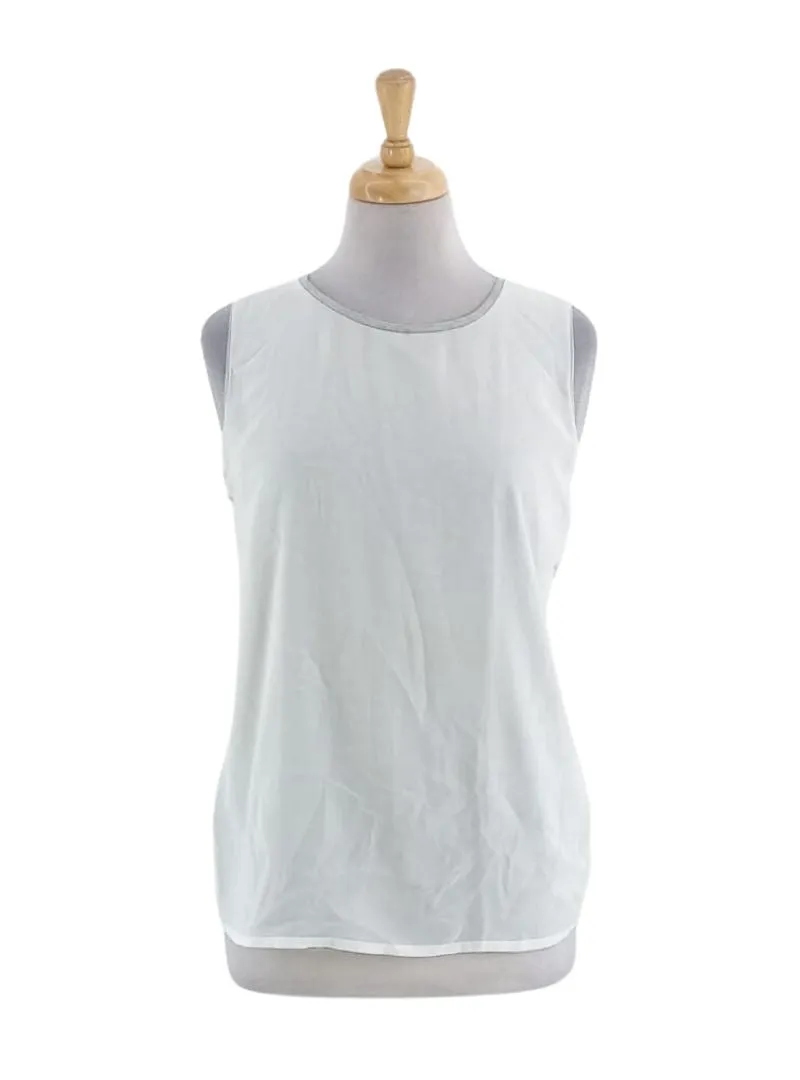 SLEEVELESS COMBO BLOUSE sold by FBO