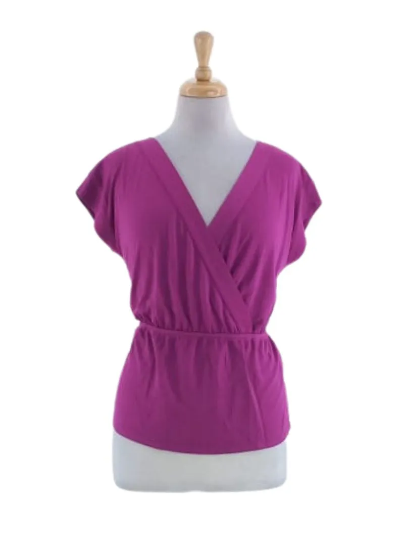 DEEP V-NECK PEPLUM TOP sold by FBO