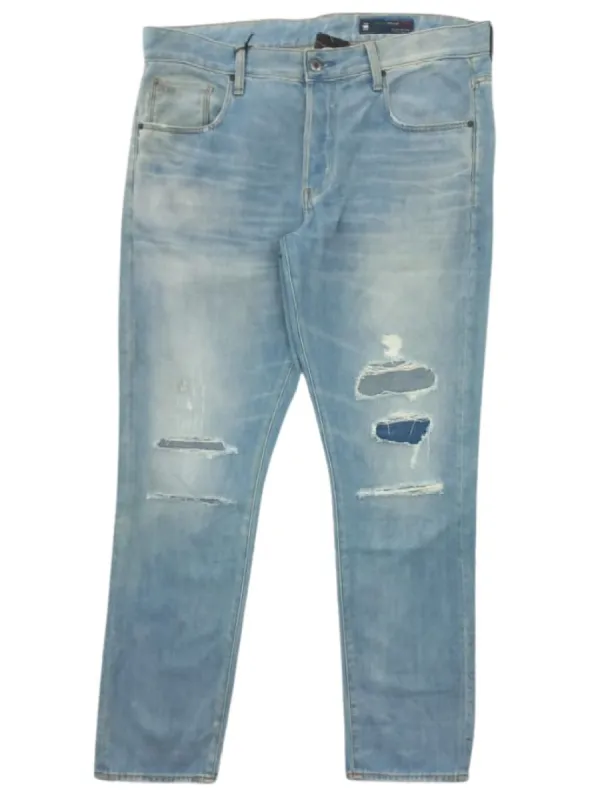 STRAIGHT TAPERED DENIM JEANS sold by FBO