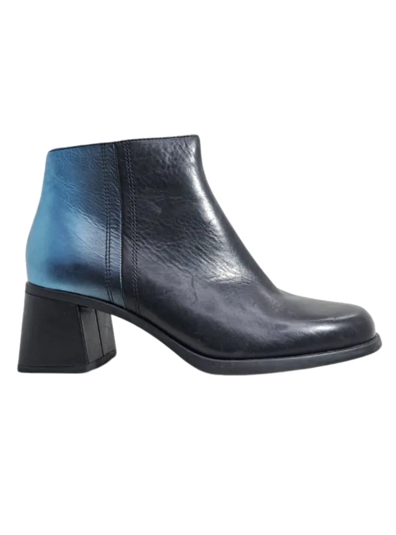 TWO TONE VINTAGE BLOCK HEEL BOOTS sold by FBO