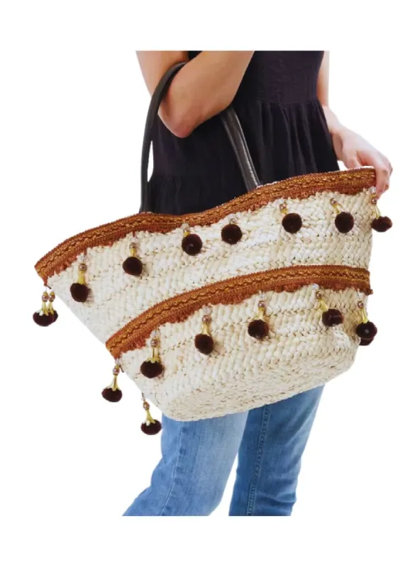 TASSLE DETAILED WOVEN BEACH BAG sold by FBO