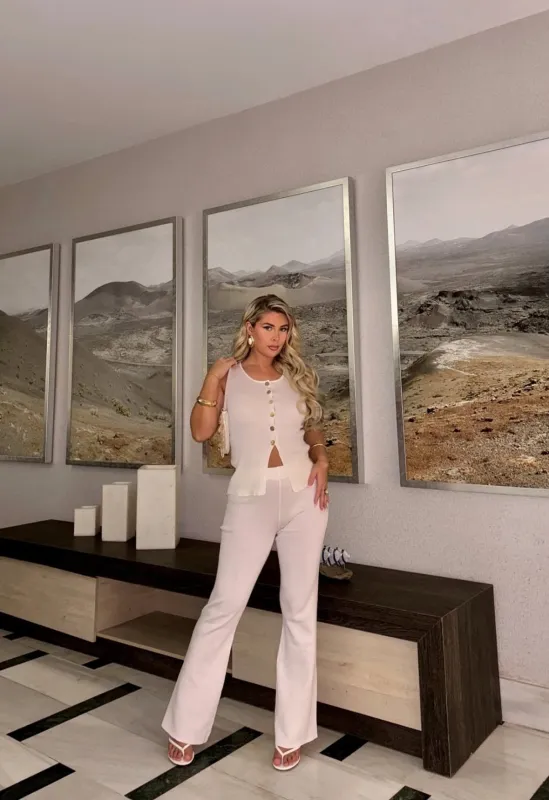 WHITE KNIT WAISTCOAT & FLAIR TROUSER SET sold by Katie Jade Boutique