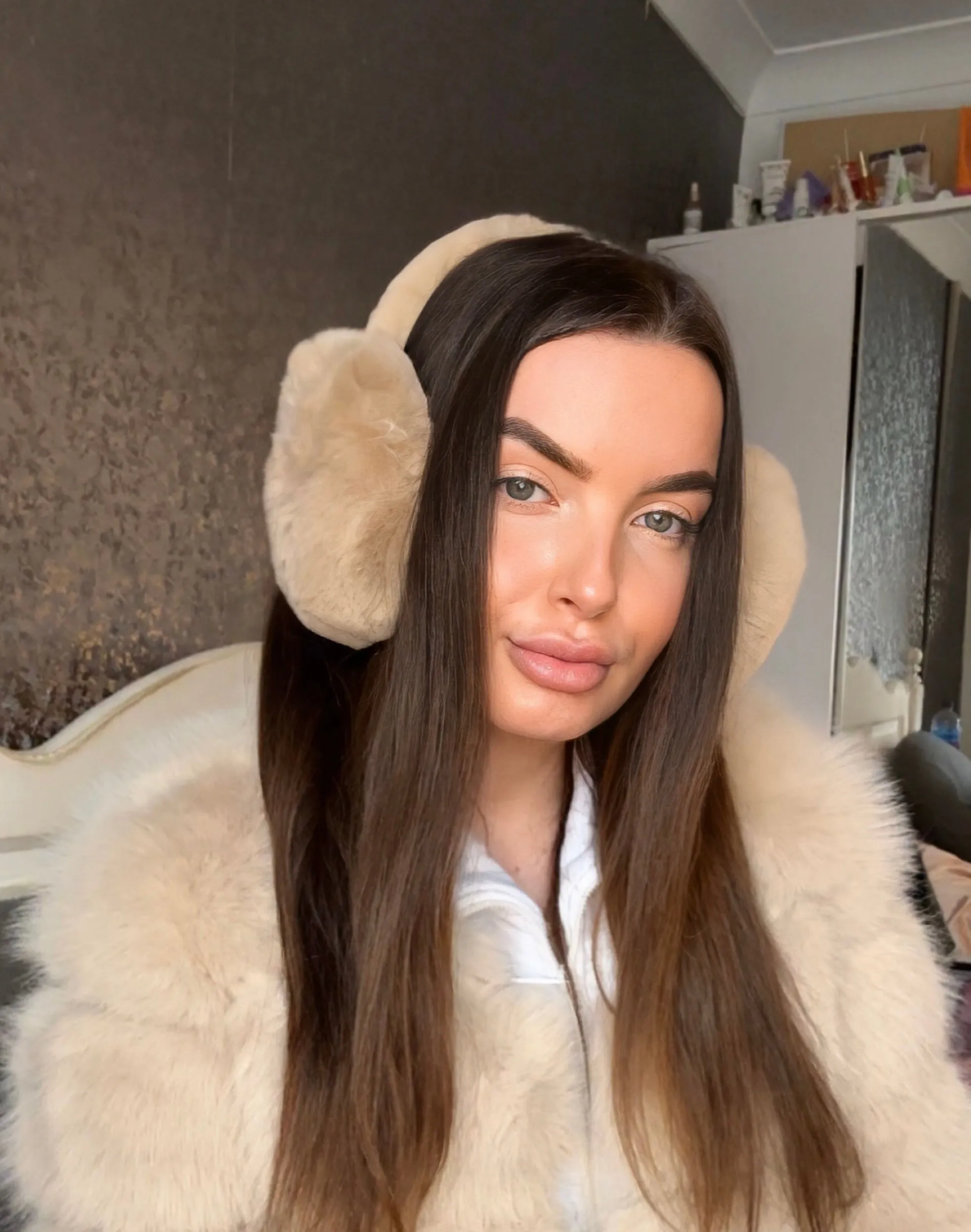 LIGHT BROWN FLUFFY EARMUFFS sold by Katie Jade Boutique