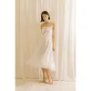 Carly Satin Bow Midi Dress sold by Ava The Label