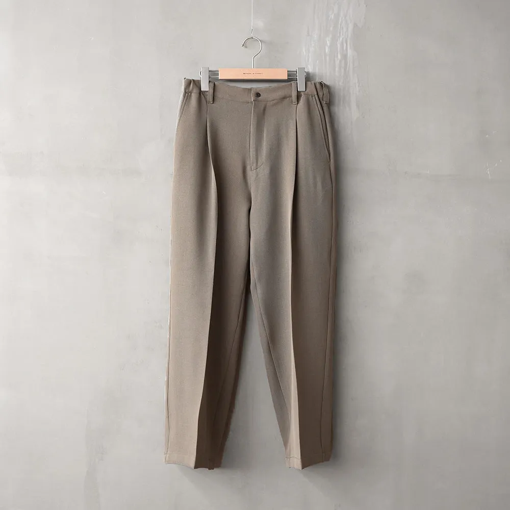 FUNCTIONAL TWILL TUCK TROUSERS sold by Manual Alphabet