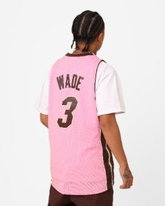 Mitchell & Ness Miami Heat Dwyane Wade Brown Sugar Bacon Swing Jersey Pink sold by Culture Kings