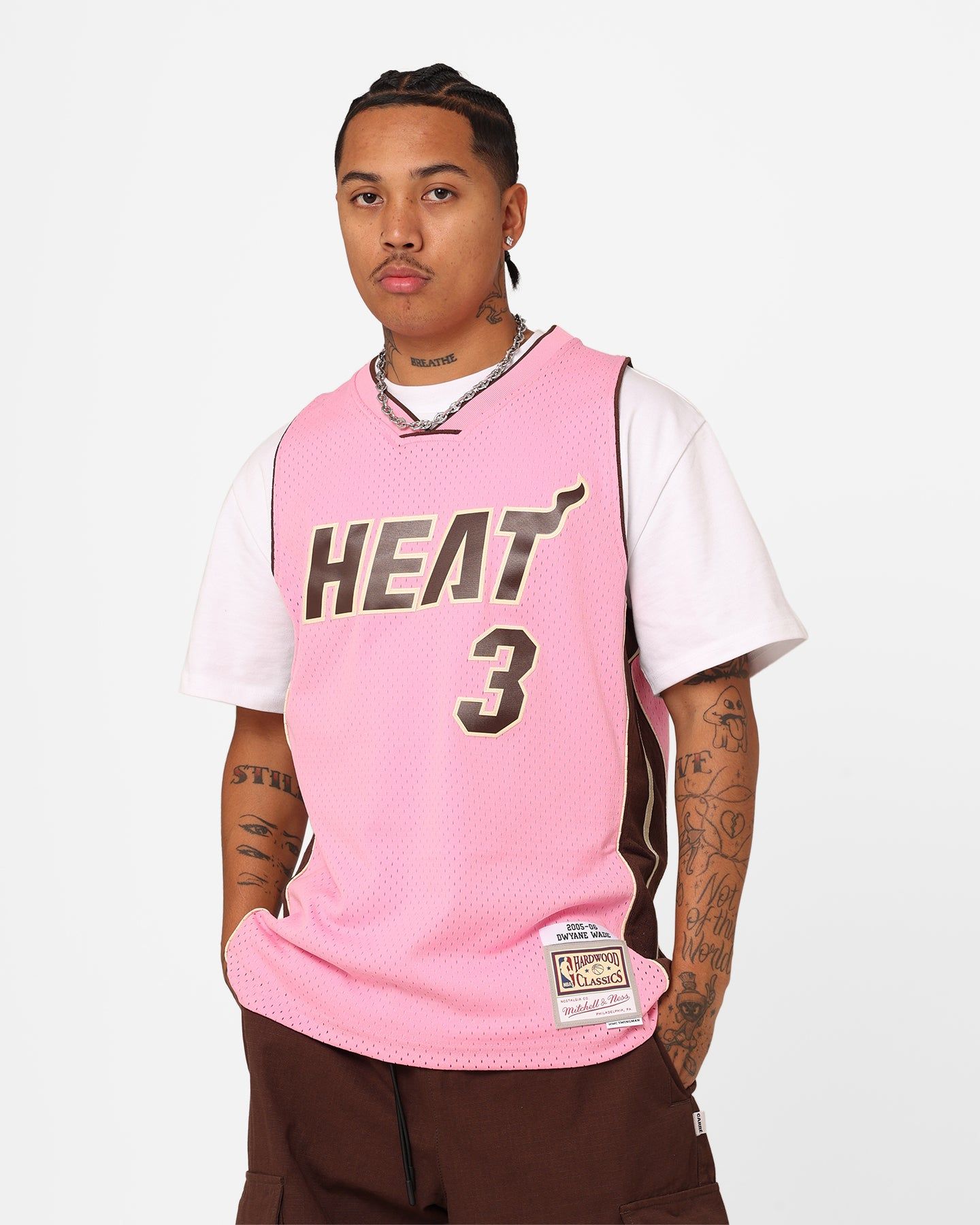 Mitchell & Ness Miami Heat Dwyane Wade Brown Sugar Bacon Swing Jersey Pink sold by Culture Kings