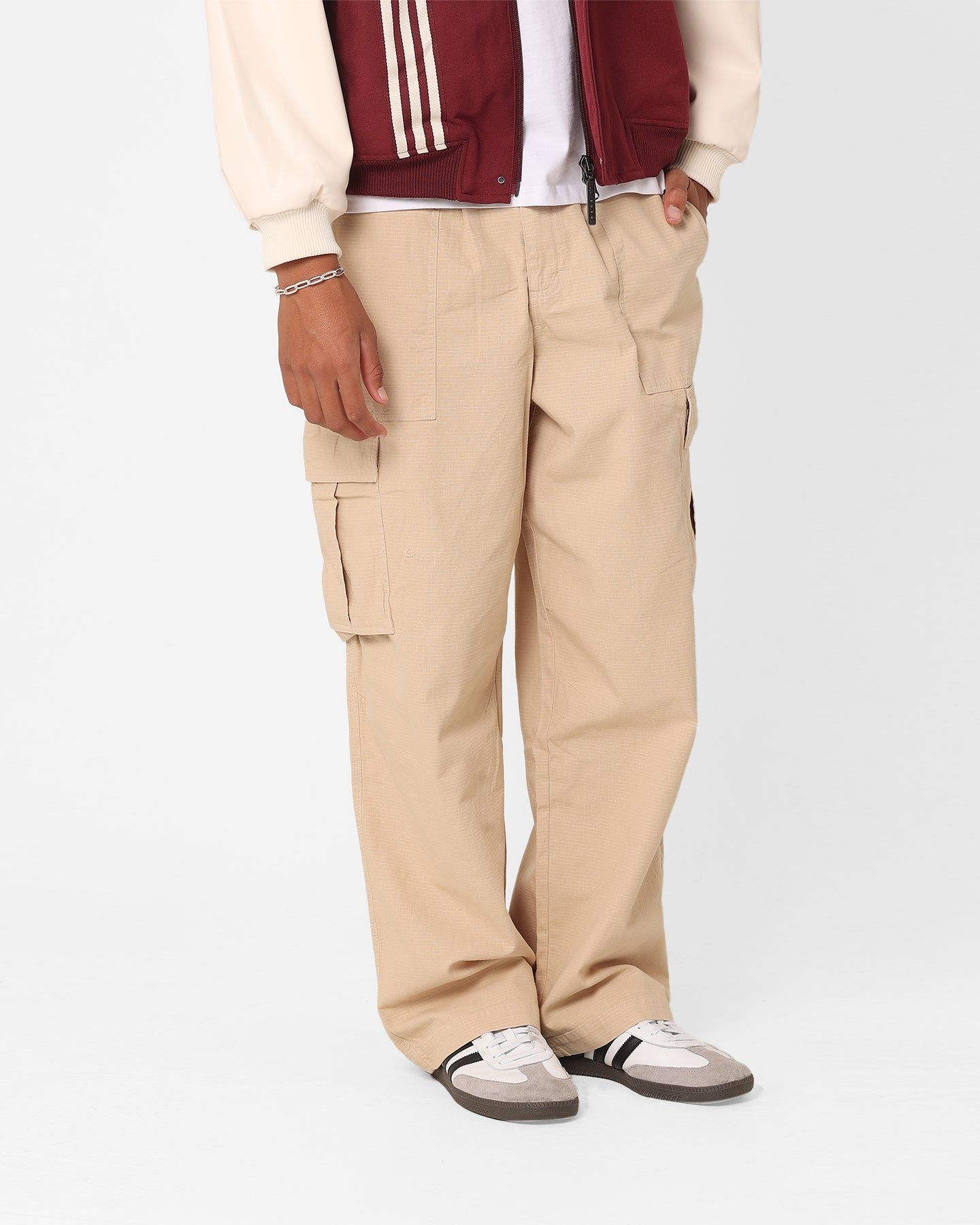 The New Establishment Cargo Pants Stone sold by Culture Kings