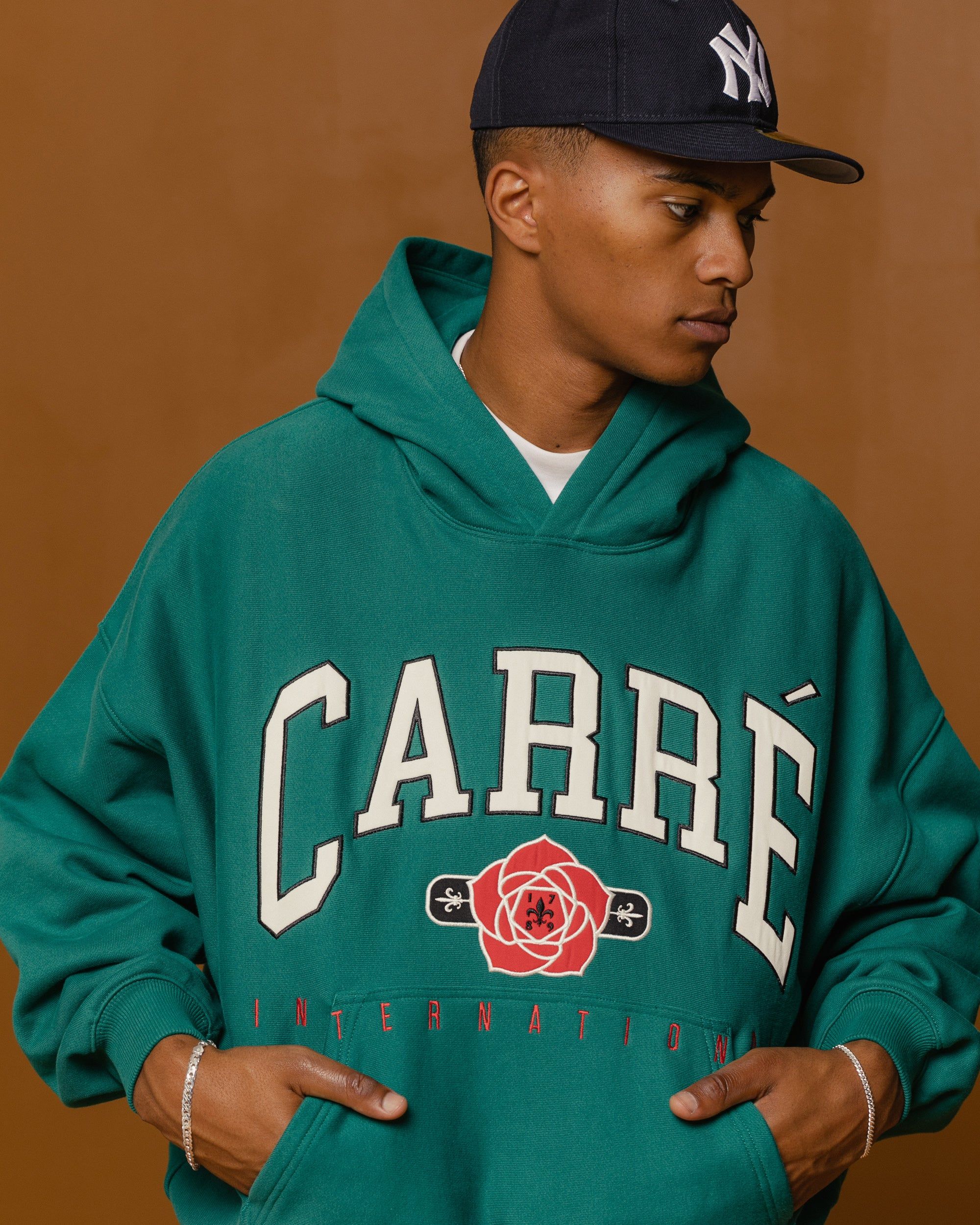 Carre Rose International Oversized Hoodie Dark Teal sold by Culture Kings