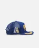New Era Houston Astros 'Podium Collection' Pre-Curved Golfer Trucker Snapback Light Royal/Metallic Gold sold by Culture Kings