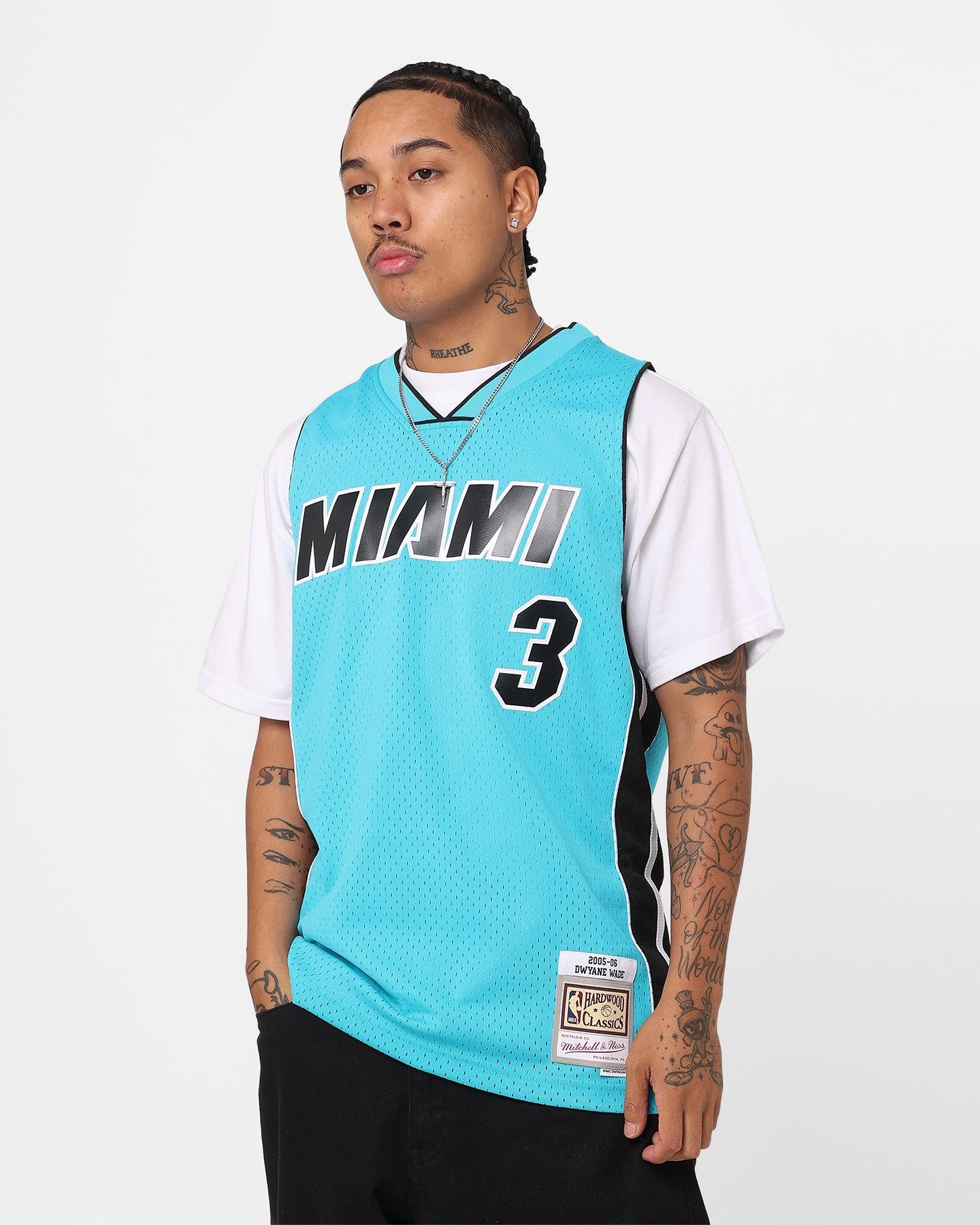 Mitchell & Ness Dwayne Wade Miami Heat Neon Tropical Swing Jersey Neon Blue sold by Culture Kings