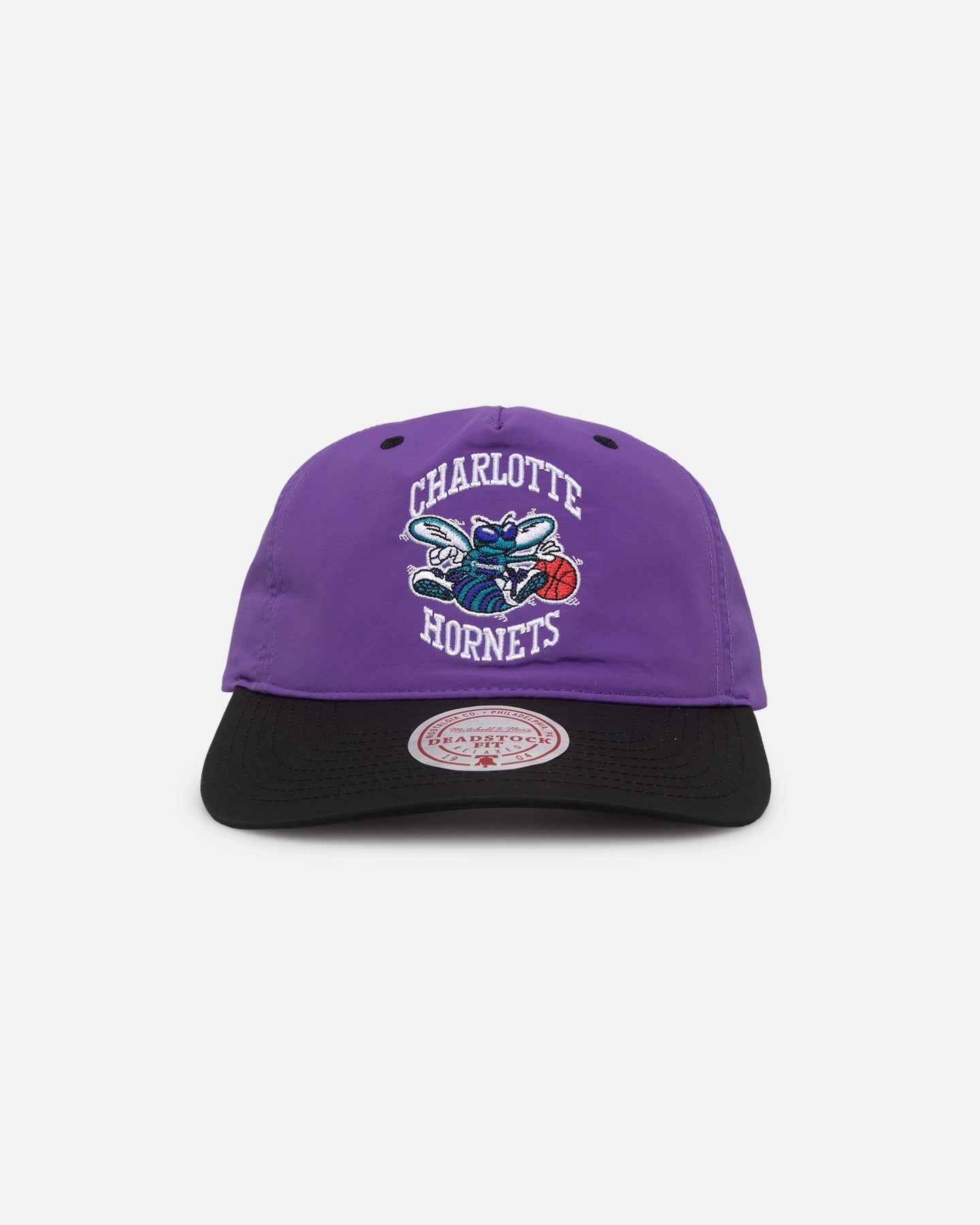 Mitchell & Ness Charlotte Hornets Nylon Deadstock 2-Tone Snapback Neon Purple/Black sold by Culture Kings