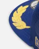 New Era New York Yankees 'Podium Pack' Pre-Curved Golfer Trucker Snapback Light Royal/Metallic Gold sold by Culture Kings