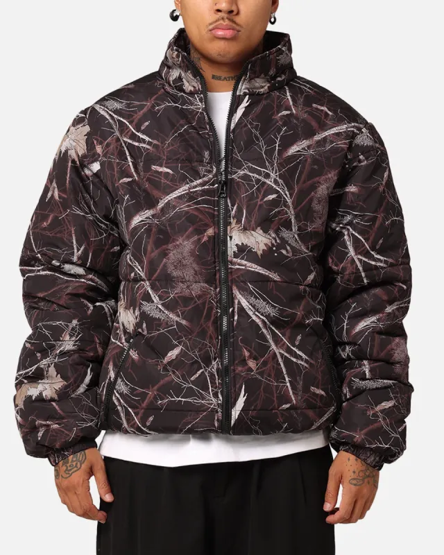 X-Large Wave Dye Puffer Jacket Dark Camo sold by Culture Kings
