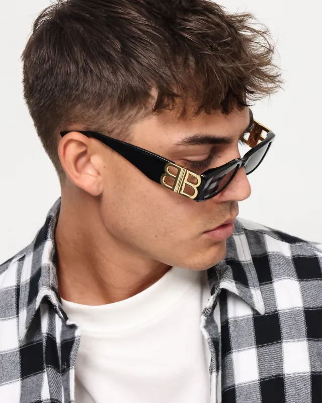 Balenciaga BB0096S001 Black/Gold sold by Culture Kings