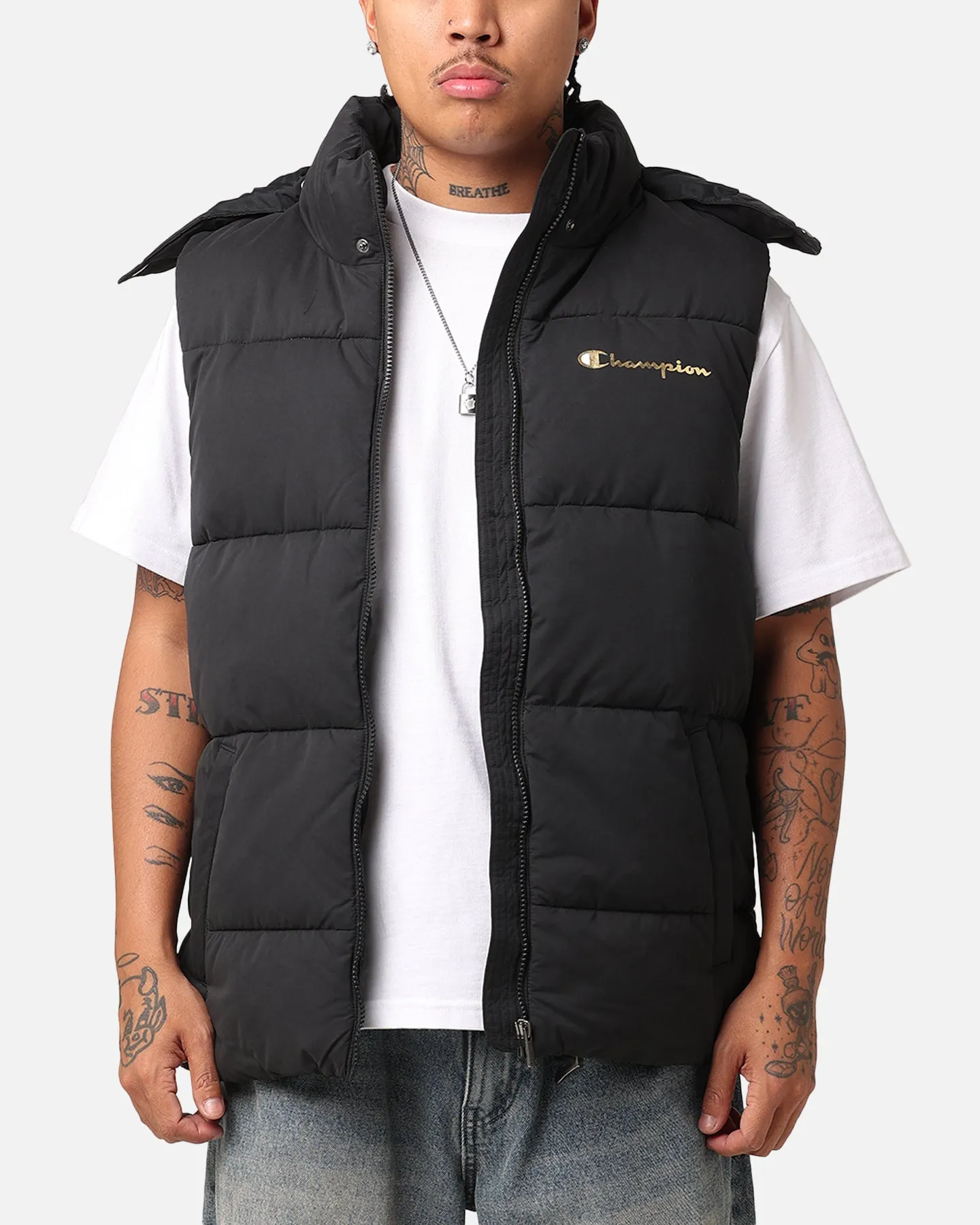 Champion Rochester Puffer Vest Black/Gold sold by Culture Kings