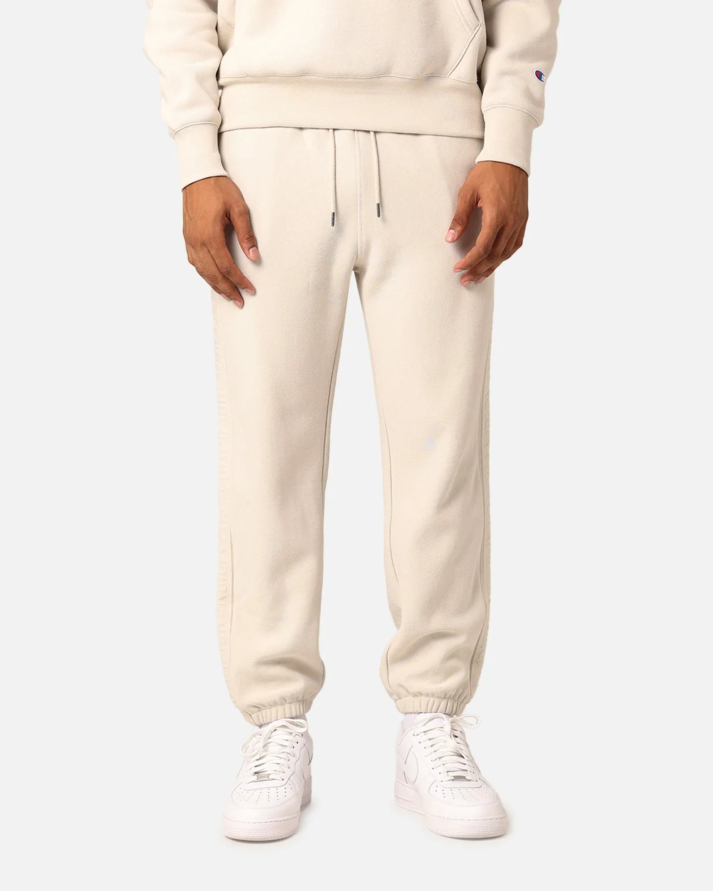 Champion Reverse Weave Terry Tape Jogger Stone sold by Culture Kings