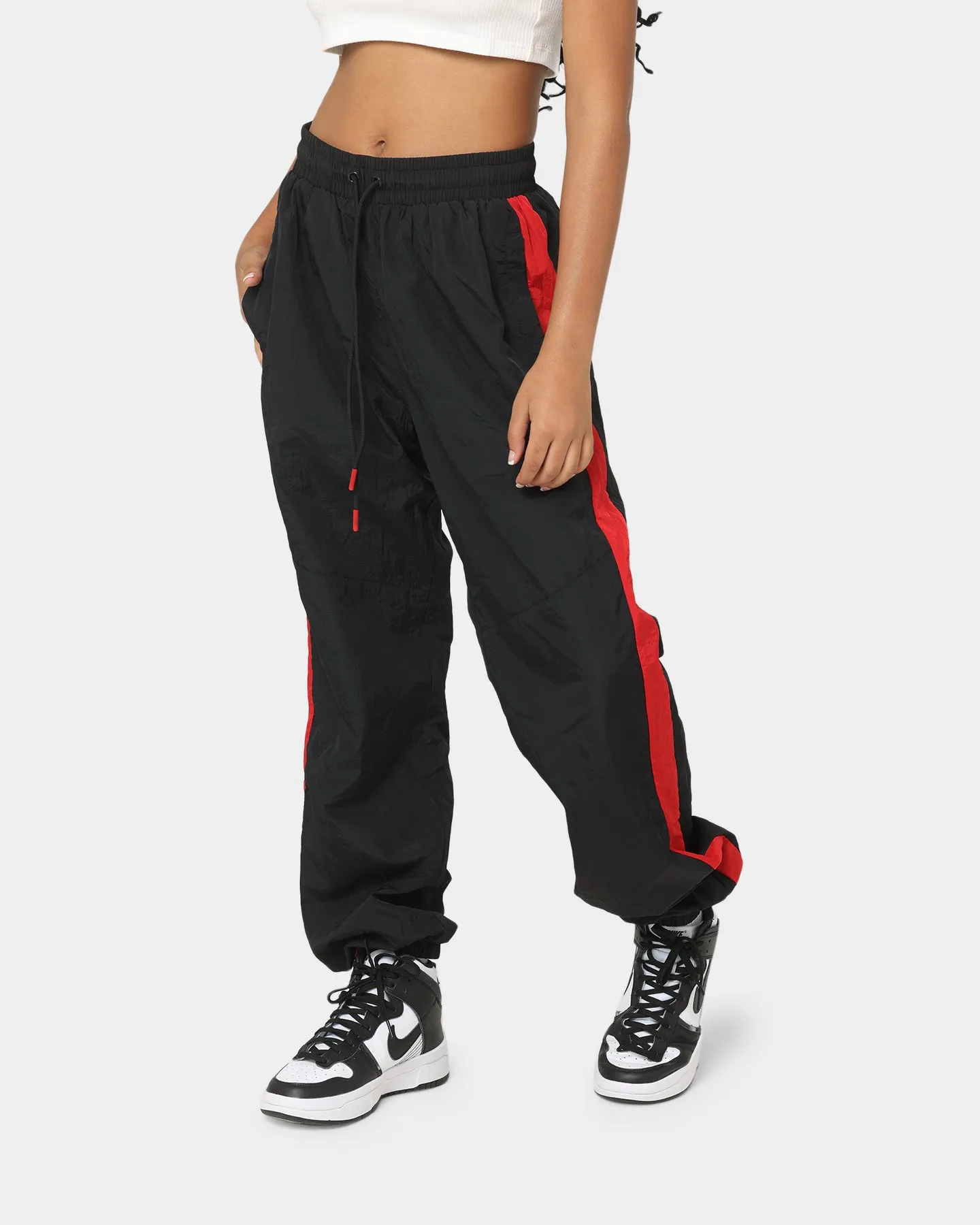 EN ES Women's Track And Field Pants Red/Black sold by Culture Kings