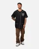 Majestic Athletic Las Vegas Raiders Denim Button Up Shirt Washed Black Denim sold by Culture Kings