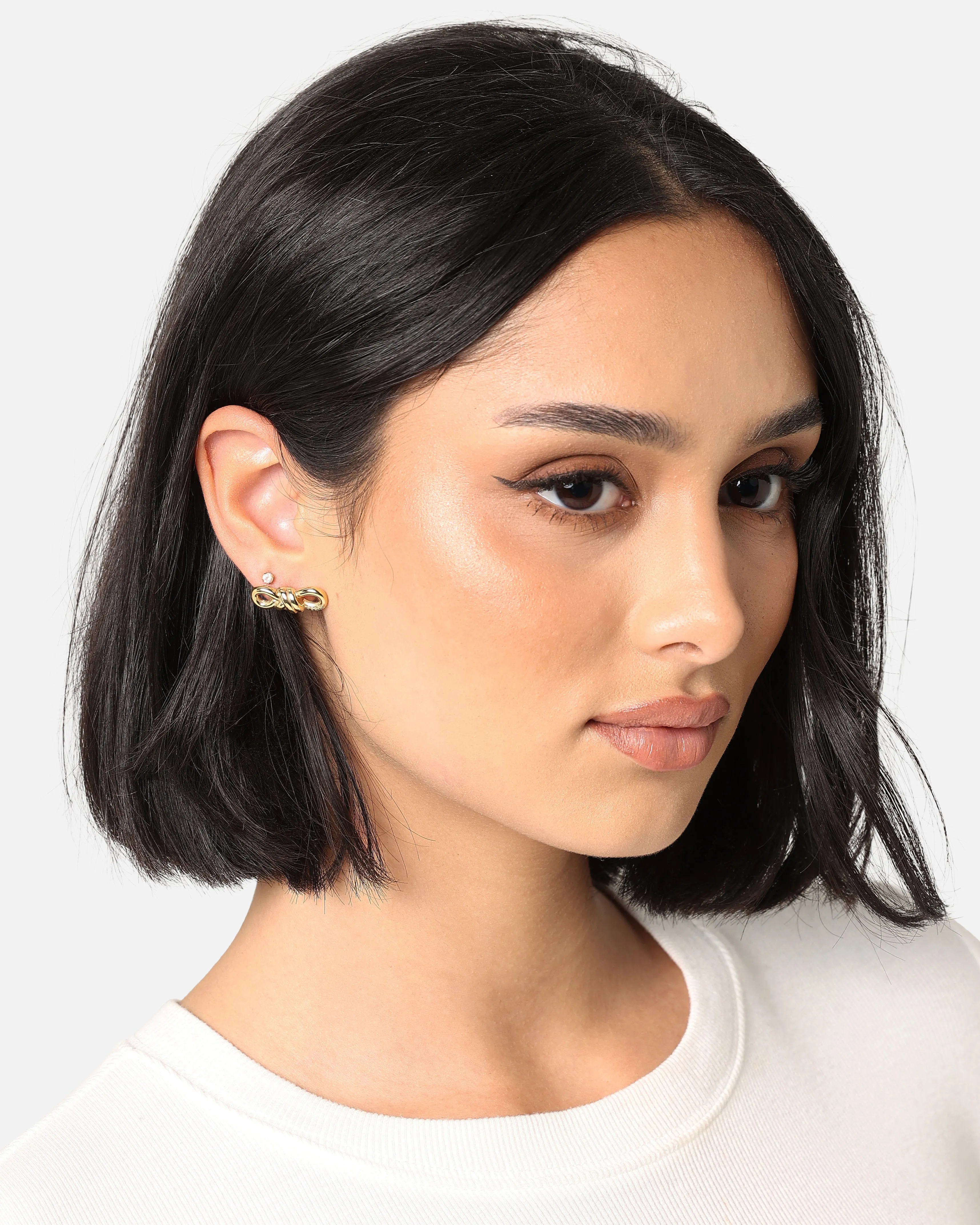 Guess Mainline Women's Modern Love 20mm Knot Stud Earrings Yellow Gold sold by Culture Kings product image thumbnail 4