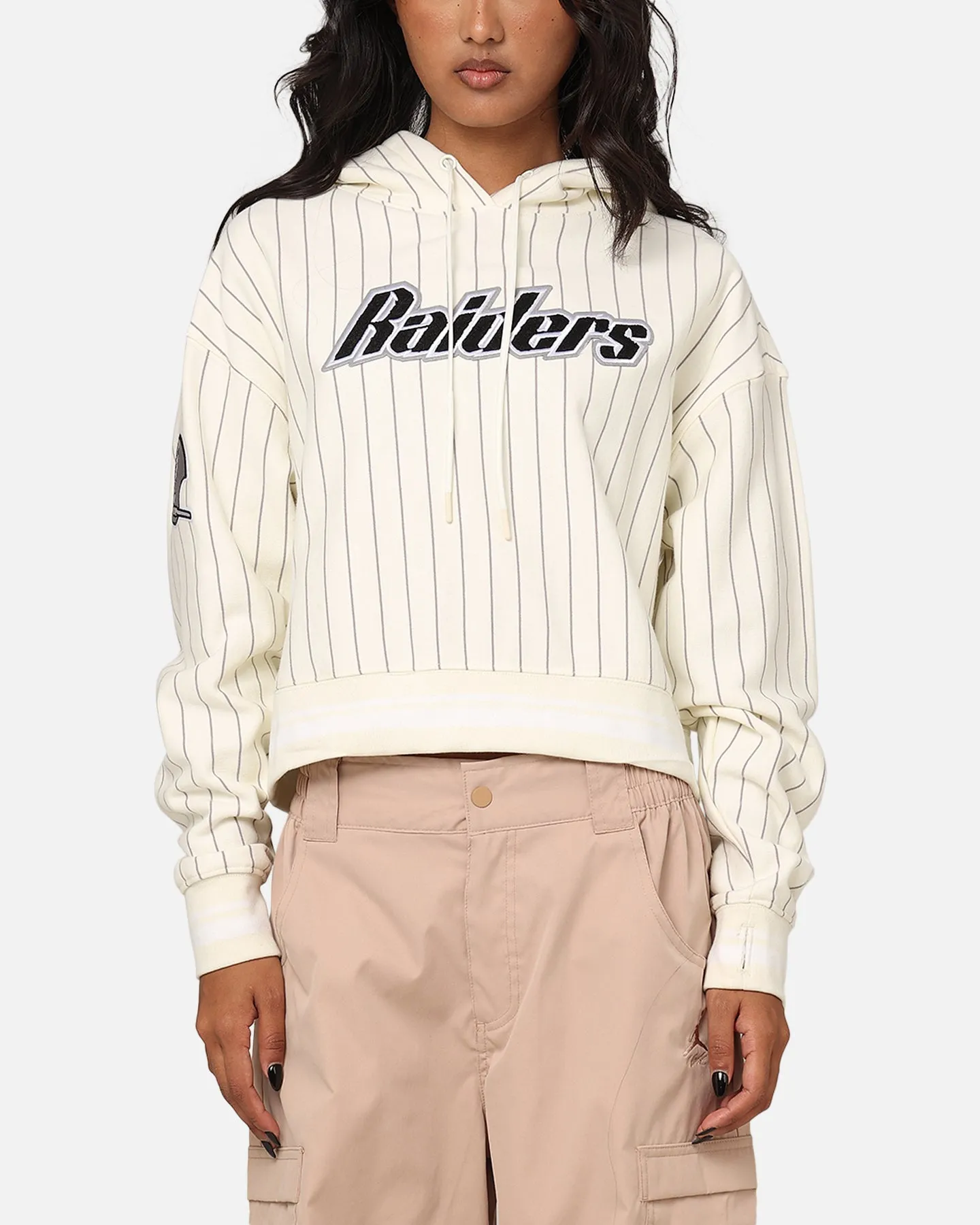 Pro Standard Women's Las Vegas Raiders Fleece Cropped Pullover Hoodie Eggshell/Grey sold by Culture Kings