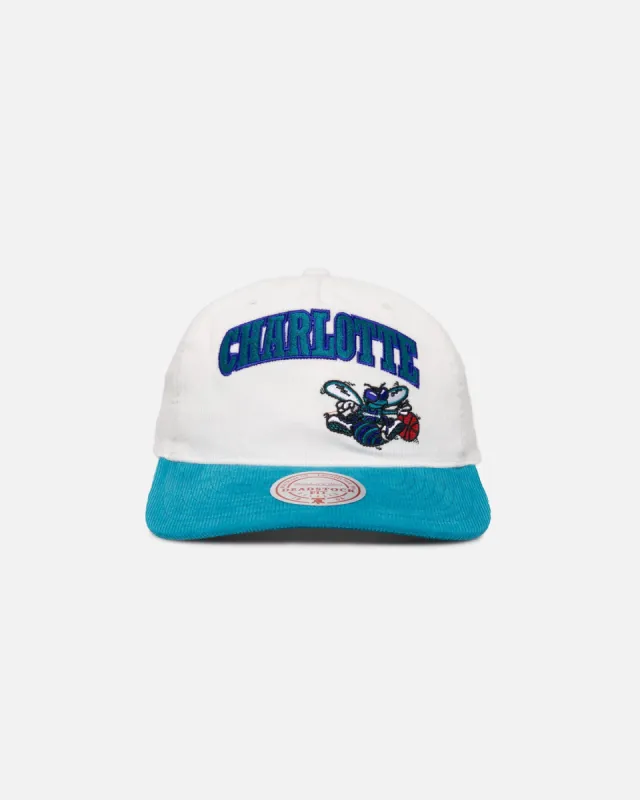 Mitchell & Ness Charlotte Hornets History Origin Snapback White/Teal sold by Culture Kings