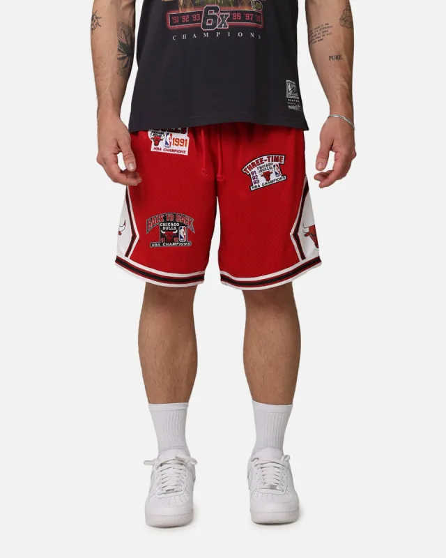 Mitchell & Ness Chicago Bulls 'UNC To Chicago' Champions Shorts Red sold by Culture Kings