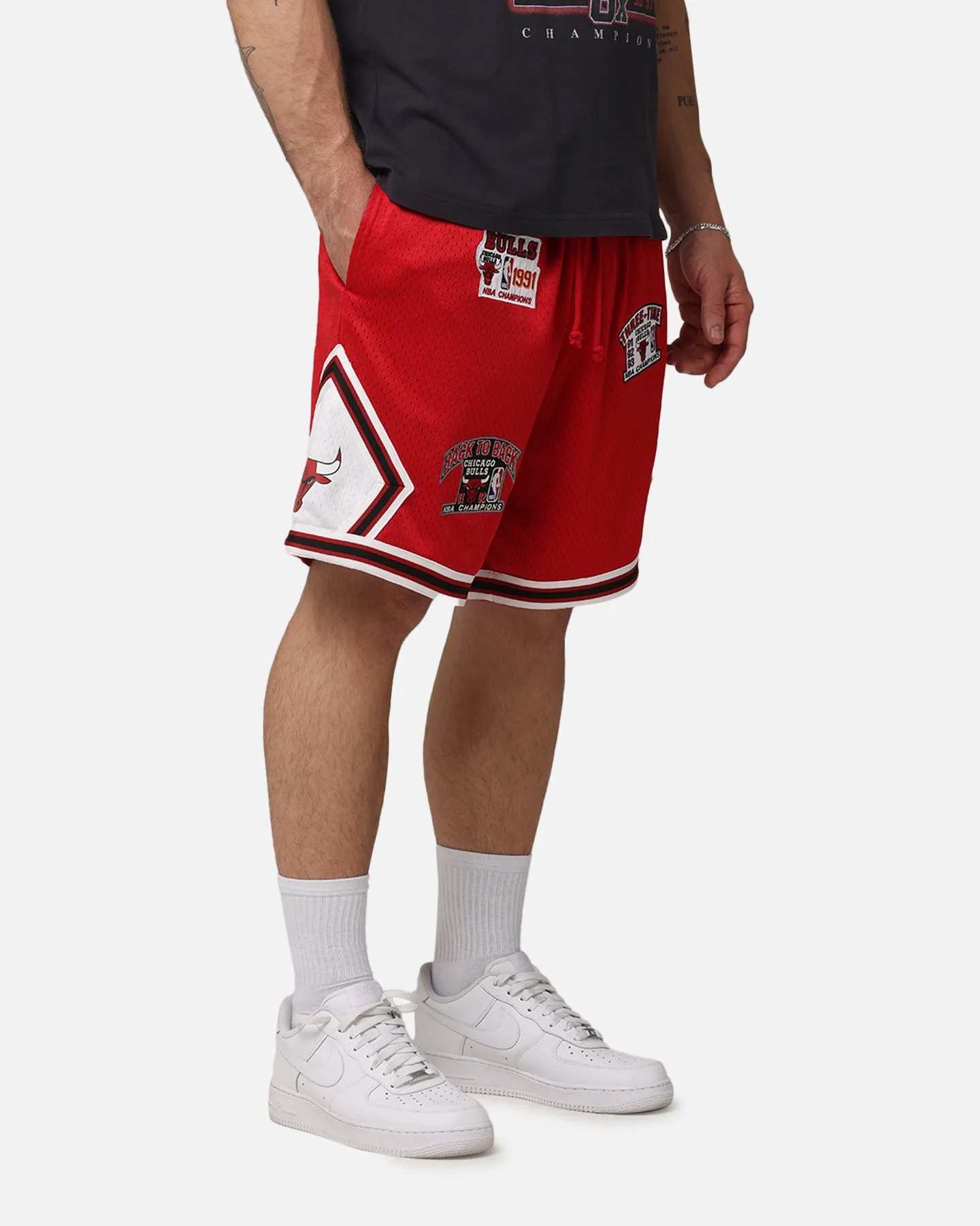 Mitchell & Ness Chicago Bulls 'UNC To Chicago' Champions Shorts Red sold by Culture Kings product image thumbnail 5