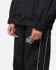 The Anti Order Track Club Nylon Jogger Black/Grey sold by Culture Kings