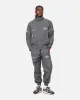 The Anti Order Track Club Nylon Jogger Dark Grey/Grey sold by Culture Kings
