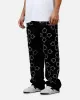 MNML Ultra Baggy Jewel Applique Pants Black sold by Culture Kings