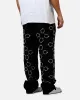 MNML Ultra Baggy Jewel Applique Pants Black sold by Culture Kings