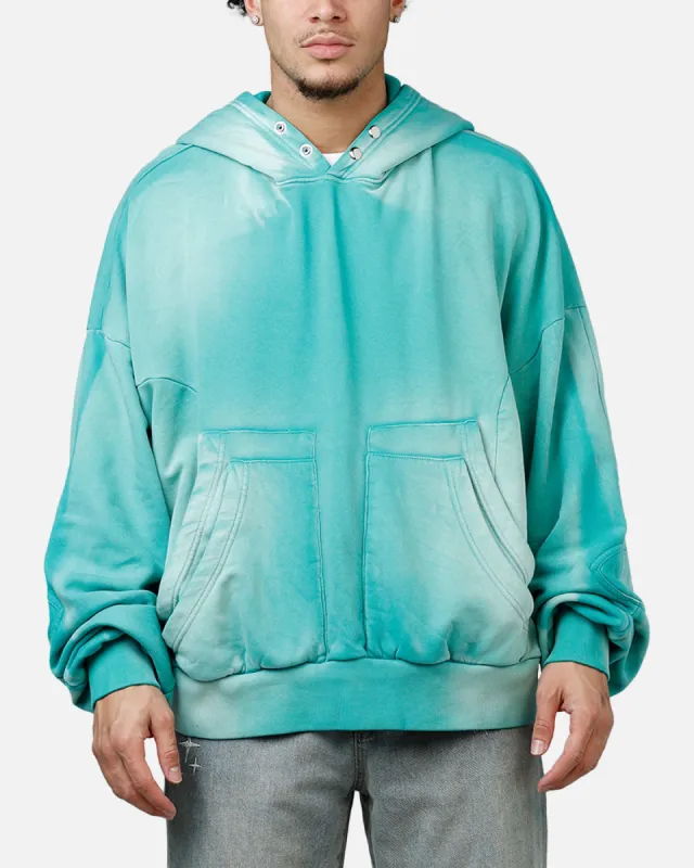 MNML Double Pouch Sprayed Hoodie Green sold by Culture Kings