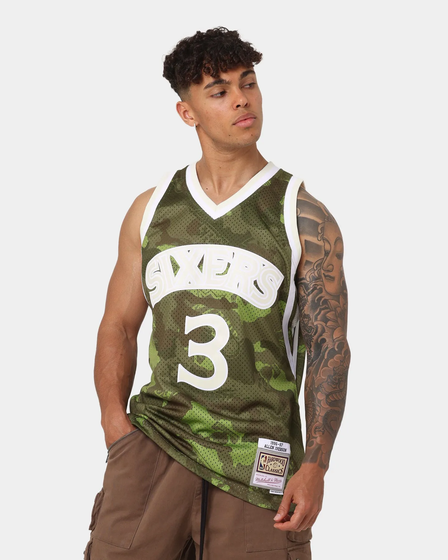 Mitchell & Ness Allen Iverson Philadelphia Sixers '96-'97 Camo Swingman Jersey Green Camo sold by Culture Kings