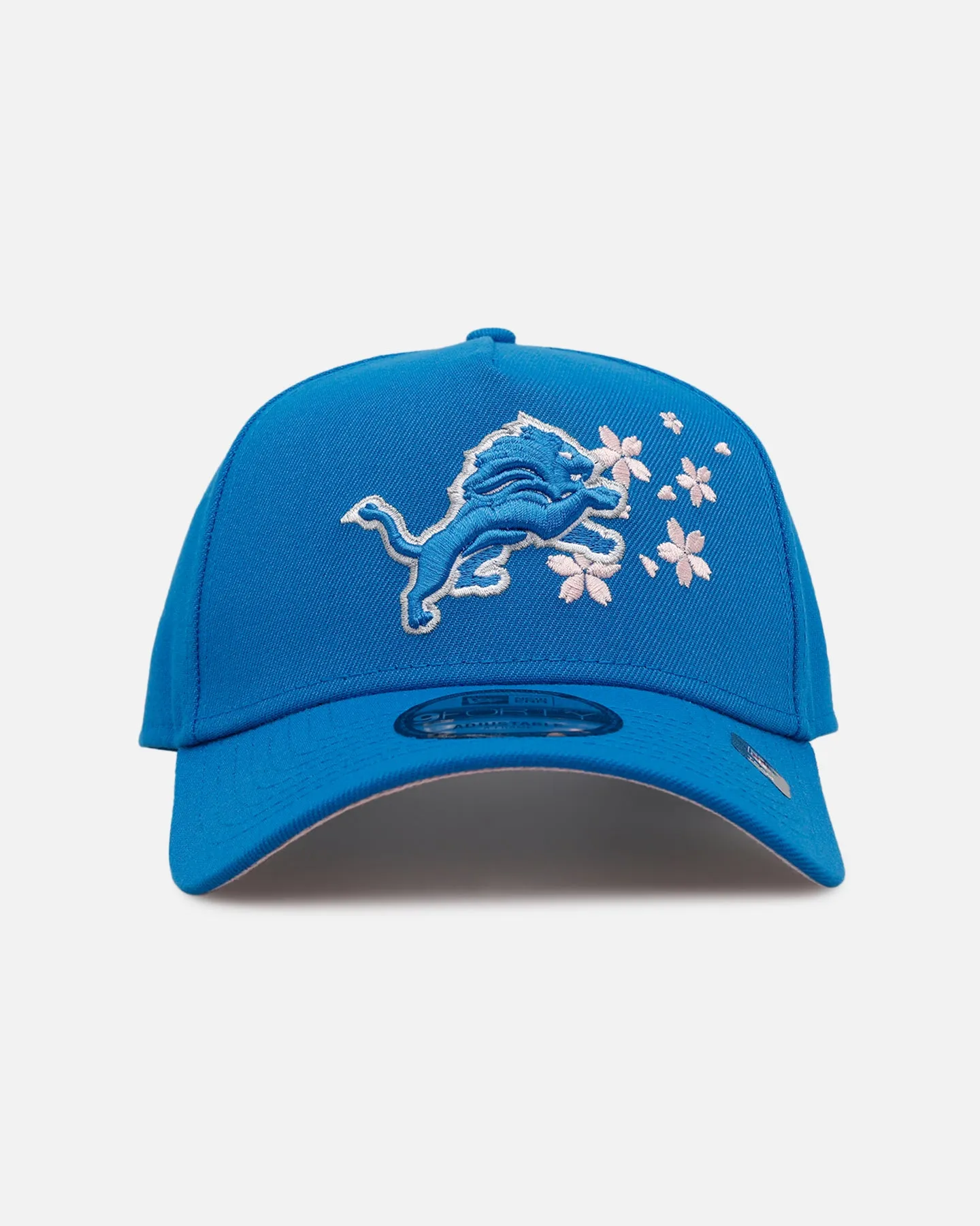 New Era Detroit Lions 'Cherry Blossoms' 9FORTY A-Frame Snapback Official Team Color sold by Culture Kings