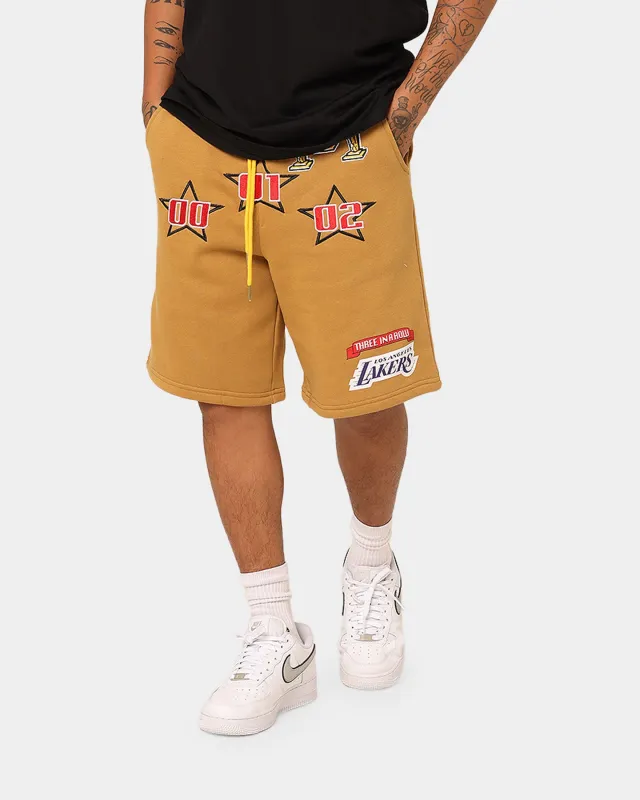 Mitchell & Ness Los Angeles Lakers 3-Peat Shorts Bone Brown sold by Culture Kings